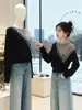 Suéter de punto irregular de dos piezas estilo retro americano para mujer, nuevo modelo primavera, otoño, invierno 2026, suéter base holgado y favorecedor