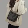 Bolso Cubo 2026 Nuevo Bolso para Mujer Primavera y Verano Piel Genuina Bolso de Hombro Cruzado de Alta Gama Tejido para Viajes