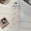 Estampa floral pequena, meias retro de cano médio, meias femininas coreanas com borda dobrada e sem costura, meias de algodão versáteis estilo faculdade japonesa