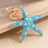 Llavero Creativo de Estrella de Mar Colgante para Coche Decoración de Bolso para Mujer Llavero de Metal Incrustado con Diamantes Serie Océano Regalo Venta al por Mayor