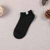 Calcetines calcetines de barco para mujer boca baja verano nuevo jacquard tela de imitación etiqueta de tela transpirable desodorante calcetines de tubo corto para amantes venta al por mayor