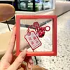 Texto acrílico criativo caractere de boa sorte cada exame será para ser Não. 1 chaveiro mochila escolar pequena pingente atacado