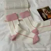 Calcetines largos rosas para mujer, estilo de celebridad de internet de moda, calcetines a media pantorrilla combinados con pantalones de tiburón, versión coreana, calcetines de pantorrilla de cintura alta para deportes