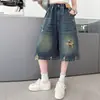 Verano 2026 Nuevos Shorts de Mezclilla Lavados Rasgados de Cintura Alta Estilo Retro Americano para Niñas, Pierna Ancha Suelta, Capris de Cinco Puntos