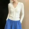 Textura en capas 2026 otoño nuevo top de mujer cuello en V suéter de punto trenzado tridimensional camisa base