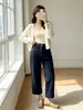 Jeans acampanados de tiro alto para mujer, elásticos en cuatro direcciones, para principios de otoño, con diseño de costuras visibles, pantalones de pierna recta con dobladillo deshilachado para un efecto adelgazante