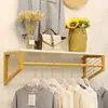 Estante de exhibición de ropa al por mayor del fabricante, perchero de pared, estante de pared para tienda de ropa de mujer, combinación de estantes para colgar ropa
