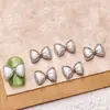 Acessórios de Nail Art Laço Estilo Chanel Tendência Laços Pequenos Decorações de Unha de Resina Atacado
