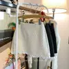 Falda de Encaje con Lunares Patchwork de Cintura Alta para Mujer 2026 Primavera Verano Nueva Versátil Antiexposición Ajustada al Cuerpo Corta