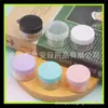 Botella de crema morada de 15 g Botella secundaria de crema Botella de muestra pequeña de mascarilla para el cabello Caja de yeso de 15 g Caja redonda de PS Botella de bálsamo labial de 15 g
