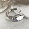 Pulseras metálicas de hoja cruzada europeas y americanas, brillantes y mate, pulseras estilo minimalista ins, joyería de diseño de nicho al por mayor