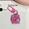 Chaveiro Fofo Luminoso Translúcido em Formato de Despertador, Pingente Doce de Desenho Animado Sanrio, Acessório Pingente para Mochila de Estudante