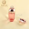 Em estoque: Conjunto de skincare de bomba rotativa de alta qualidade, incluindo frascos de vidro nos tamanhos 35-100ml para loções e potes de creme transparentes de 50g