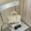 2026 Otoño Nuevo Estilo Coreano Retro Bolso de Hombro de Moda Más Vendido Color Sólido para Viajes Diarios Bolso Cruzado Tipo Cubo
