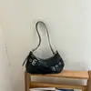 Bolsas femininas de nicho de alta qualidade grande capacidade 2026 nova verão retrô ombro único axila bolsa trabalho通勤 bolsa moderna