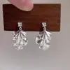 Pendientes Retro de Hoja de Ginkgo Tridimensional Estilo Francés para Mujer, Diseño de Nicho con un Toque de Lujo, Accesorios para Orejas con Forma de Espiral para Mosquitos
