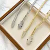 Collar Magnético con Forma de Serpiente Incrustado de Diamantes Moda Europea y Americana Cadena Versátil para Suéter Diseño Personalizado Accesorios Colgantes de Ropa de Alta Gama