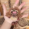 Colgante Sonajero Cáscara de Semilla Natural Hecho a Mano Estilo Año Nuevo Estilo Lazo de Bufanda Colgante de Sonido de Oso Planta Fruta