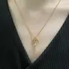 Nuevo Producto de Celebridad de Internet Más Vendido en Douyin Colgante de Llave de Trenzado de Cuerda de Lujo Accesible Microincrustado Acero de Titanio Collar Antidecoloración