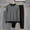 Suéter de punto de cuello redondo de lujo ligero para hombre, combinable, de espiga, otoño e invierno, suéter nuevo, ajustado, para llevar debajo, manga larga, moda