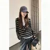 Otoño 2026 Nuevo Estilo Coreano Retro Rayas Nicho Con Capucha Falso Dos Piezas Adelgazante Versátil Tejido Artículo Caliente Top