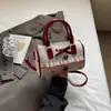 2025 Nuevo Estilo de Verano Dulce Femenino Corazón Bolso Boston Rosa Lazo Nicho Viajero Hombro Cruzado Bolso de Mano