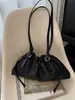Elegante y con estilo, bolsa tejida de cordón de cuero genuino con forma de nube, bolso de mano plisado, nuevo modelo de verano, bolso de hombro simple para el día a día.