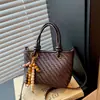 Elegante bolsa de balde com padrão trançado para mulheres, nova moda outono 2026, bolsa transversal versátil para o dia a dia