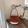 Bolso de axila de nicho de moda estilo coreano para mujer, Nuevo bolso de mano de moda Primavera 2026, Bolso de hombro con patrón tejido vintage