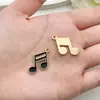 Conjunto Misto de 40 Pingentes de Joias Musicais com Gotejamento de Óleo Apresentando Guitarra, Violino, Piano e Pingentes Dourados para Acessórios de Chaveiro DIY