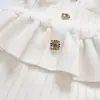 Nueva familia SP primavera y verano para mujer, estilo francés, fragancia pequeña, alta gama, cuello en V, temperamento, hueco, hebilla de taladro, cintura, vestido de punto