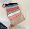 Camisola sin costuras de seda helada de longitud media sin tirantes para mujer con almohadillas en el busto, espalda hermosa, bordes ondulados y diseño anti-exposición