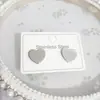 Oferta Especial Venta Caliente Pendientes de Acero de Titanio de Alta Calidad Lujo Ligero para Mujer, Accesorios de Oreja Versátiles de Moda Tendencia con Forma de Corazón, Opciones de Color y Cantidad