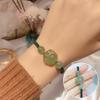 Pulsera de cuerda simple valiente cristal de fresa verde tejido a mano puro joyería de cuerda roja venta al por mayor cristal polvo de hielo regalo para amigas