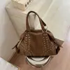 Bolso de mujer transfronterizo de gran capacidad 2026 nuevo casual con tachuelas para el hombro y la axila para viajes y desplazamientos bolso tote