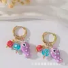 Pendientes de acero inoxidable de color caramelo con forma de corazón, estilo europeo y americano, moda, pendientes con colgante de ojo del diablo, venta al por mayor