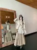 Camiseta Estilo Férias com Renda e Estampa Manga Longa Saia Midi de Cintura Alta para Mulheres 2025 Outono Novo Conjunto da Moda