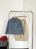 Valle del Viento 2026 Otoño Nueva Moda Fresca y Tendencia Camisa de Mezclilla Azul Claro para Niños Chaqueta Versátil para Niños de Primavera y Otoño