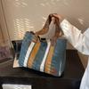 Bolsa de Mano Grande para Viajes Transfronterizos Estilo Nuevo 2026 Bloques de Color Lona Correa Ancha para el Hombro Bolso de Moda para Mujer
