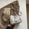 Bolso Pequeño Exquisito de Alta Apariencia de Moda para Mujer Modelo Nuevo 2026 Tela de Parches Estilo Nacional Bolso Cubo de Hombro Bolso Cruzado de Nicho