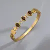 Pulsera Transfronteriza de Acero Inoxidable Europea y Americana Pulsera de Acero de Titanio Piedra Ojo de Tigre Pulsera de Pareja Simple Versátil Moderna Elegante Pulsera Abierta