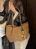 Bolso tejido retro 2026 de alta gama, nuevo diseño de moda, bolso de hombro de gran capacidad para ir al trabajo, bolso tote para debajo del brazo, estilo popular