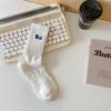 Calcetines de algodón para hombre y mujer, con dibujos animados en blanco y negro, de longitud media, bordados para parejas, para estudiantes, para combinar con todo, de caña alta, deportivos, de moda.