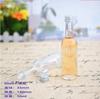 Botella de aceite de oliva cuadrada al por mayor, botella de vidrio para aceite de nuez de 500 ml, botella vacía para aceite de camelia de 750 ml, botella redonda para aceite de oliva.