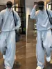 Tendencia Otoño 2025 Traje Casual de Botón Turquesa de Gama Alta para Hombre Conjunto de Dos Piezas Sudadera y Pantalón de Chándal Sueltos y Fáciles de Combinar para Pareja