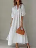 Nuevo vestido de otoño estilo francés con cuello en V, corte holgado, elegante, de dobladillo ancho, adelgazante, estilo vacacional, manga tres cuartos, largo