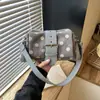 Bolsa de axila retrô de bolinhas de nicho para mulheres, nova bolsa de ombro transversal vintage requintada de alta qualidade para o outono de 2026