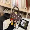 Bolsa de ombro transfronteiriça, moda fresca e doce, nova bolsa de mão vintage outono 2026 para mulheres, bolsa transversal popular de bolinhas