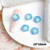 Tiktok nueva resina floreciente tallada joyería para uñas luminosa Camelia accesorios de joyería para uñas flor al por mayor