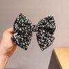 Corea del Sur horquilla con estampado de leopardo horquilla con lazo grande adulto celebridad de internet moda parte trasera de la cabeza temperamento accesorios para el cabello femenino clip superior tocado